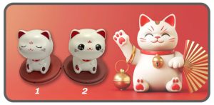 แมวกวักท่านั่งส่ายหัว